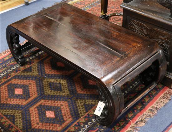 A Chinese carved hardwood low table W.99cm